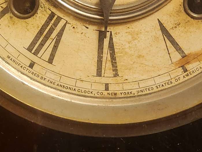 Vintage Ansonia Wall Clock in an Ornate Oak Casing