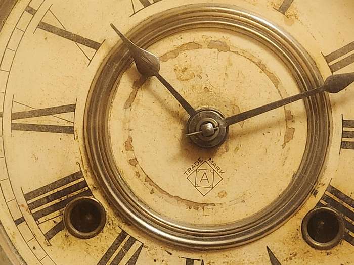 Vintage Ansonia Wall Clock in an Ornate Oak Casing