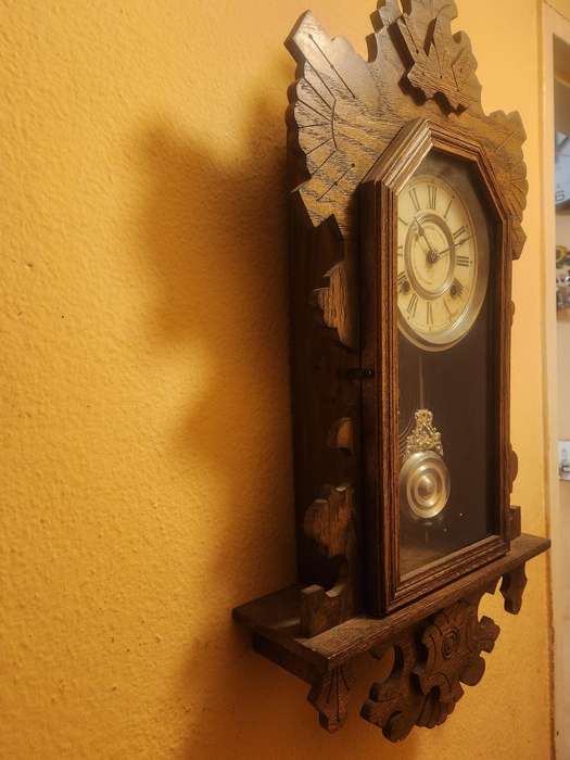 Vintage Ansonia Wall Clock in an Ornate Oak Casing