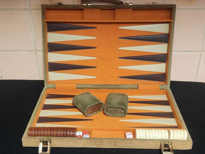 BACKGAMMON SET IN A CORDUROY BOUND CASE WITH FELT LINING