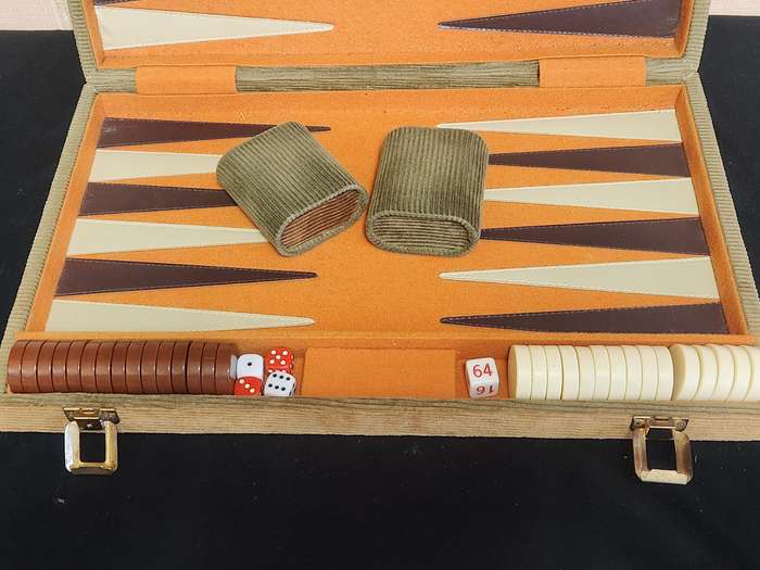 BACKGAMMON SET IN A CORDUROY BOUND CASE WITH FELT LINING