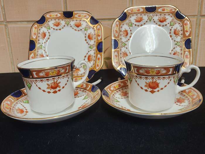 PAIR OF ROYAL VALE COLCLOUGH IMARI STYLE BONE CHINA TEA TRIOS