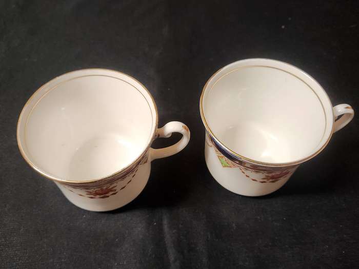 PAIR OF ROYAL VALE COLCLOUGH IMARI STYLE BONE CHINA TEA TRIOS