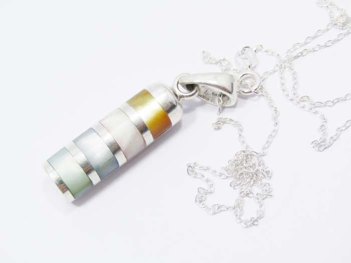 A Gorgeous Mother of Pearl Cylinder Design Pendant in Sterling Silver.