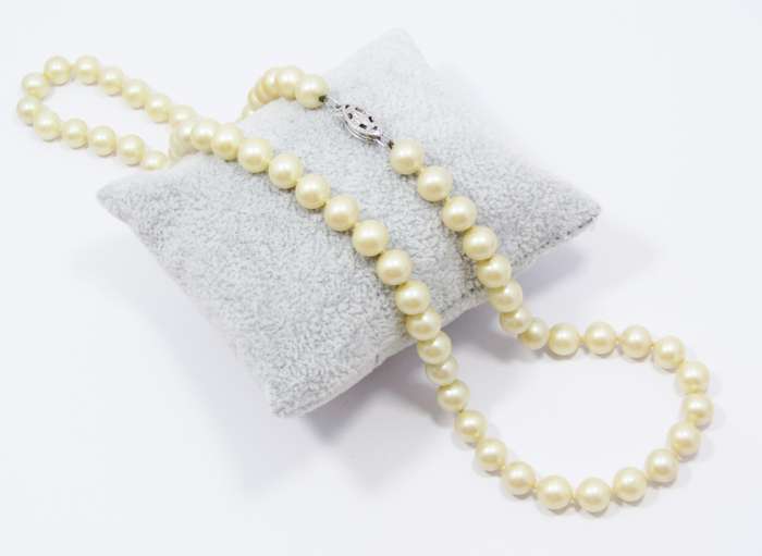 A Lovely String of  Vintage Faux Pearls with a Sterling Silver Clasp