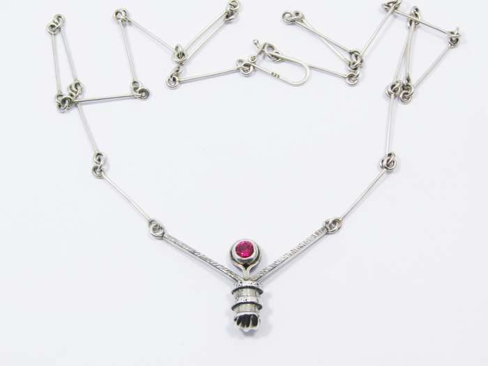 A Stunning Weighty Red Paste Stone Necklace in Sterling Silver