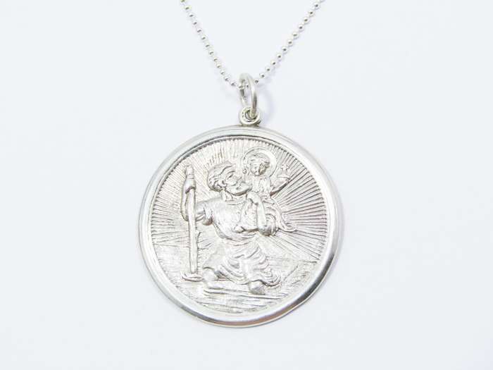 A Beautiful Detailed Round St Christopher Pendant on Chain in Sterling Silver.