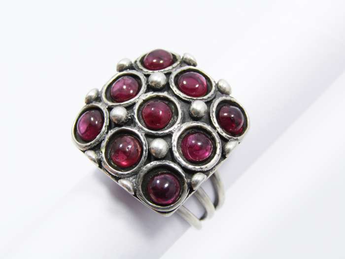 A Gorgeous Chunky Ring set With Cabochon Garnets in Sterling Silver.