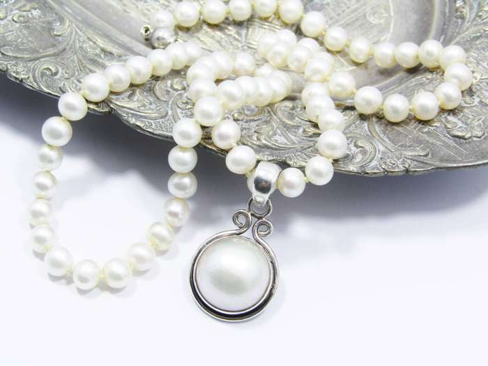 A Gorgeous Fresh Water Pearl Necklace with a Mabe Pendant  Slider in Sterling Silver
