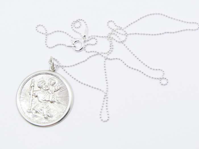 A Beautiful Detailed Round St Christopher Pendant on Chain in Sterling Silver.