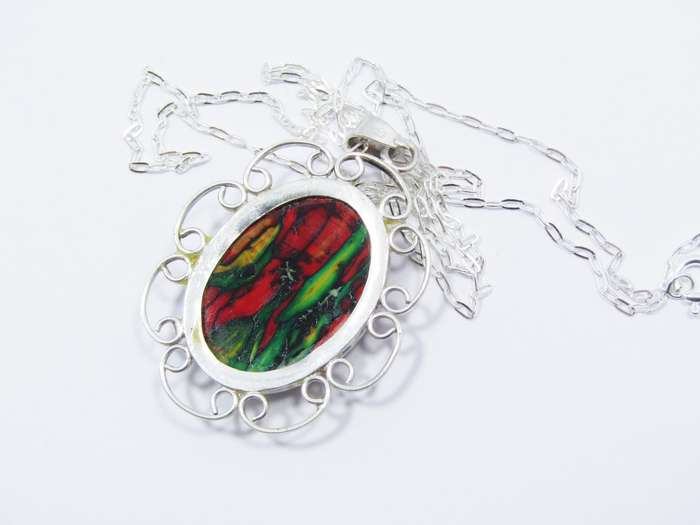 A Lovely Detailed Acrylic Pendant on Chain in Sterling Silv