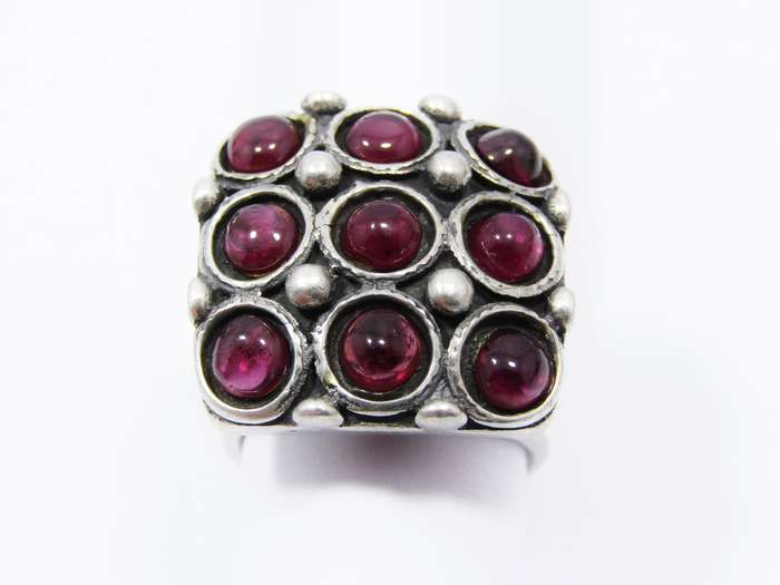 A Gorgeous Chunky Ring set With Cabochon Garnets in Sterling Silver.
