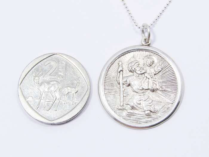 A Beautiful Detailed Round St Christopher Pendant on Chain in Sterling Silver.