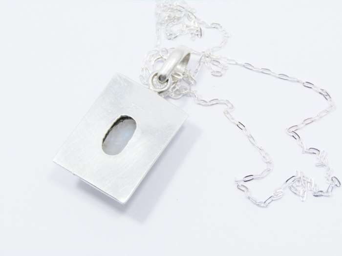 A Lovely Large Moonstone Pendant on Chain in Sterling Silver.