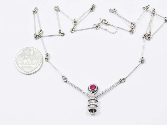 A Stunning Weighty Red Paste Stone Necklace in Sterling Silver