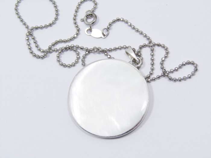 A Lovely Large Mother of Pearl Pendant on Chain in Sterling Silver