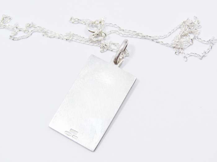 A Gorgeous Textured Madonna Engraved Pendant on Chain in Sterling Silver.