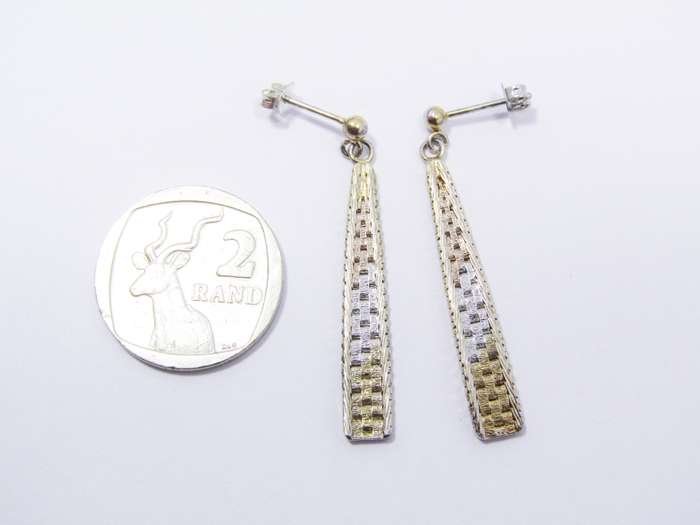 A Stunning Pair of Two Tone Dangling Earrings in a Gold Tone Over Sterling Silver