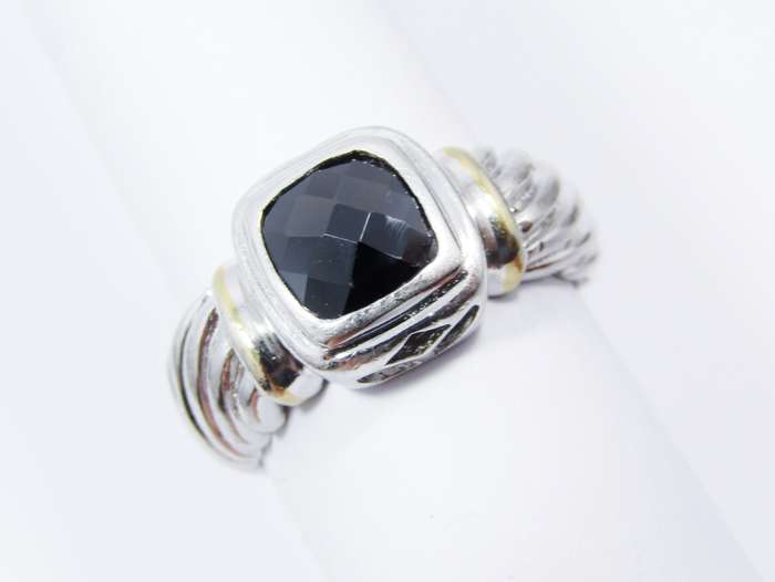 A Lovely Facetted Two Tone Black Stone ring in Sterling Silver.