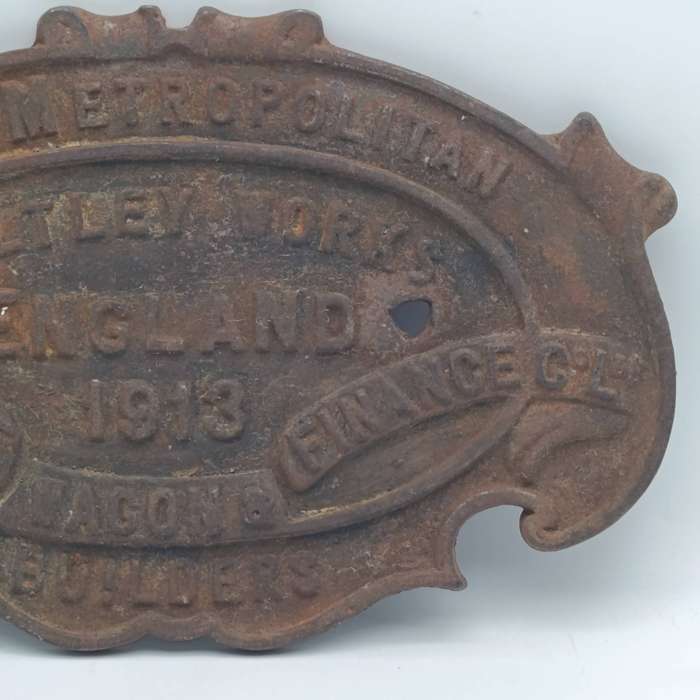 Antique 1913 The Metropolitan Carriage wagon builders cast iron plate