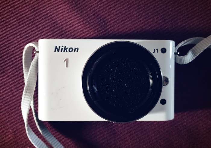 Nikon 1 J1 with 1 NIKKOR lens 10mm Digital Camera Kit