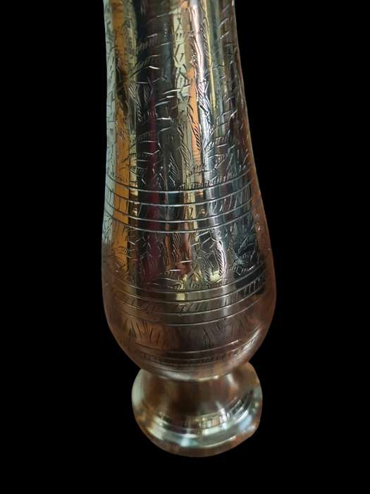 Etched brass vase