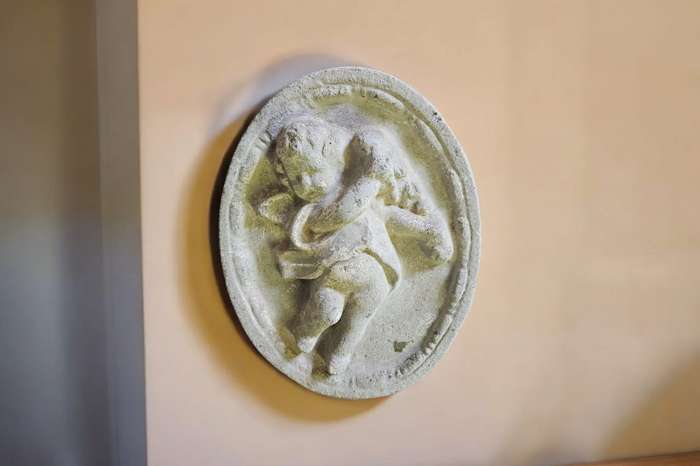 Angel Oval Concrete Wall Plaque, measuring 36x29x4cm