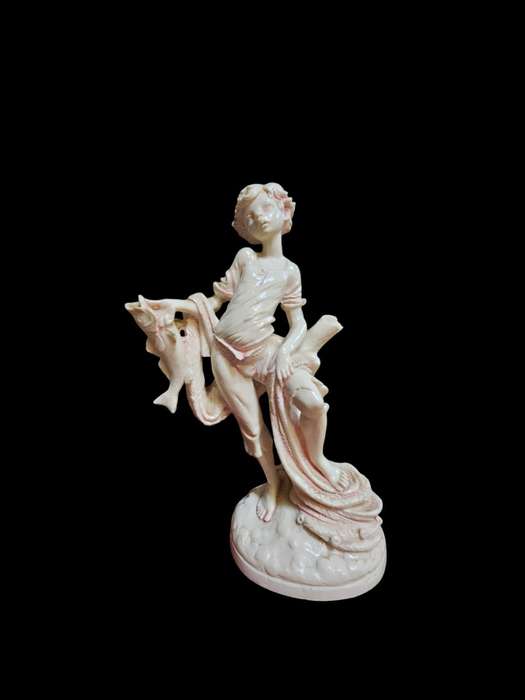 Le Ron stone-lite ornamental display figurine of a young boy