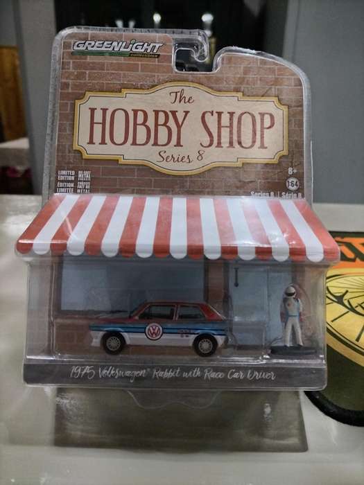 GreenLight Hobby Shop 1975 Volkswagen Rabbit with race car driver