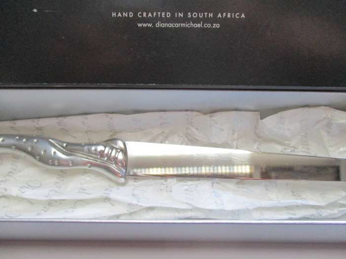 Diana Carmichael Cheetah Letter opener in original box - good condition.