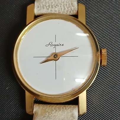 Vintage Roguire ladies hand-winding watch with white strap