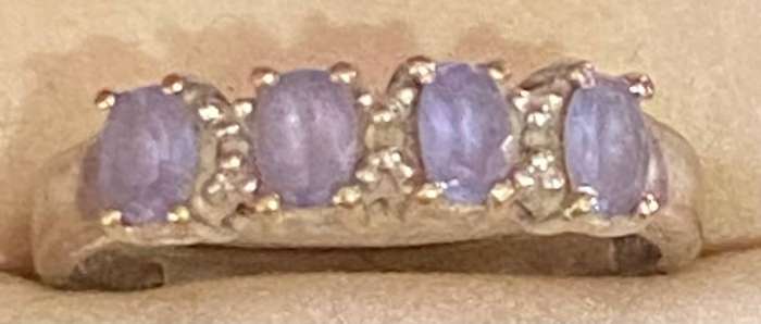 9ct white gold and four tanzanite gem stone ring