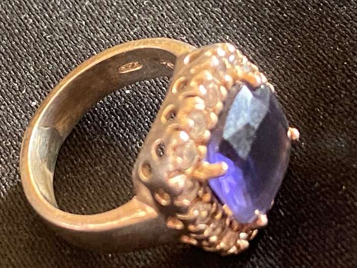 Stunning Sterling Silver ring with simulated Blue centre stone and Cubic Zircon's around