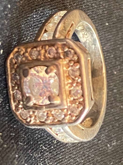 Stunning sterling  Silver with large CZ and more CZ's  in a square and down side Ring