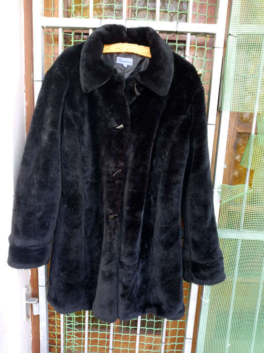 Luxurious faux fur, black coat