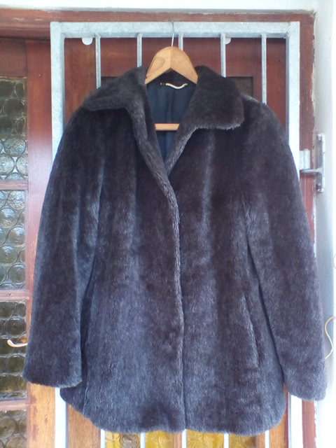 Exquisite designer black fur coat