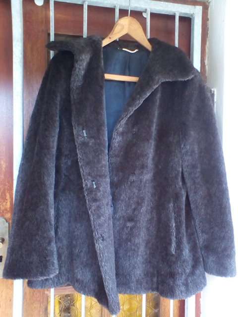 Exquisite designer black fur coat