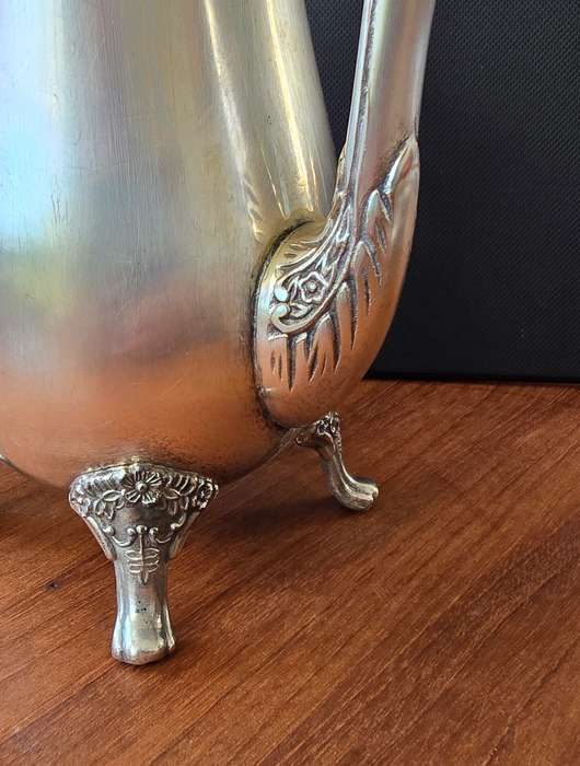 Plated Silver coffee pot, with expected patina. Completely usable & could last another 100 years.