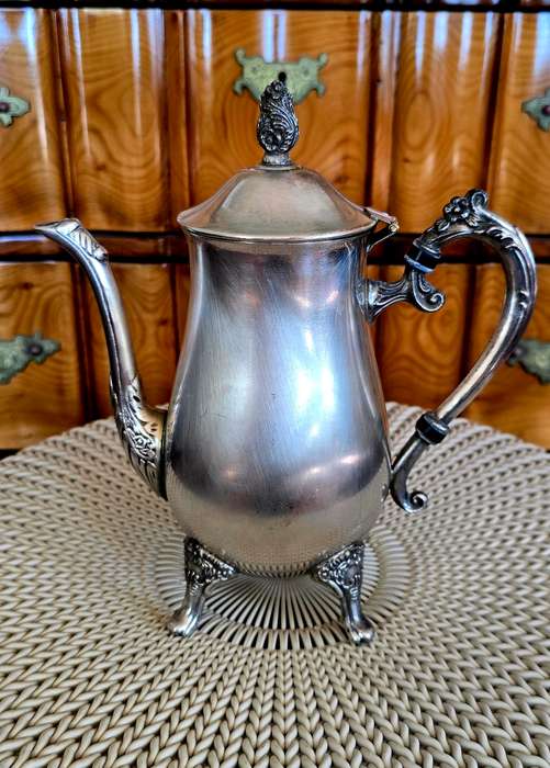 Plated Silver coffee pot, with expected patina. Completely usable & could last another 100 years.