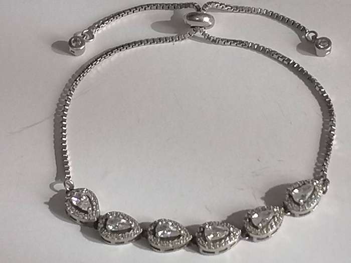 Stylish swivel locking snake chain bracelet, sterling silver with beautiful stones.