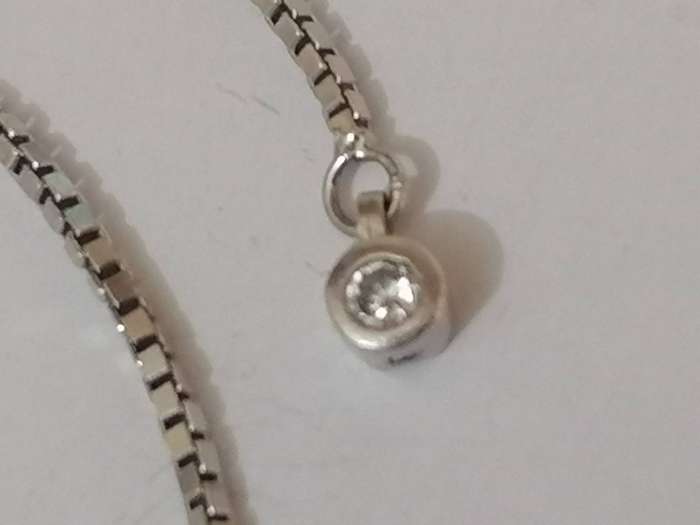 Stylish swivel locking snake chain bracelet, sterling silver with beautiful stones.