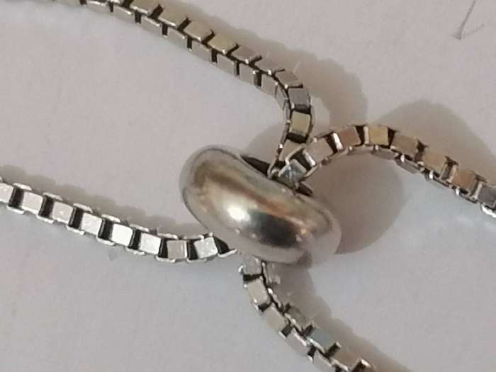 Stylish swivel locking snake chain bracelet, sterling silver with beautiful stones.