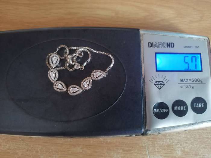 Stylish swivel locking snake chain bracelet, sterling silver with beautiful stones.