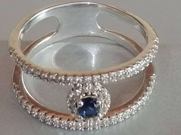 Stunning Sterling Silver 925. blue stone dress ring with CZ stones - Size P.
