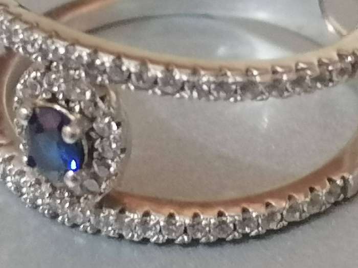 Stunning Sterling Silver 925. blue stone dress ring with CZ stones - Size P.