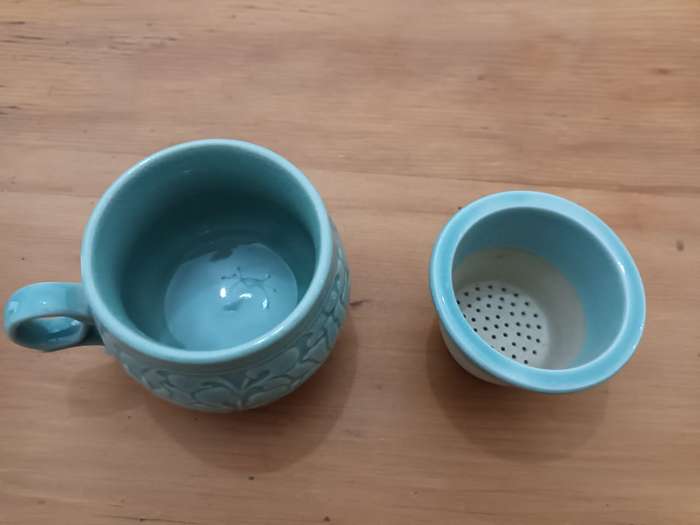 Vintage Korean celadon tea cup and matching ceramic infuser