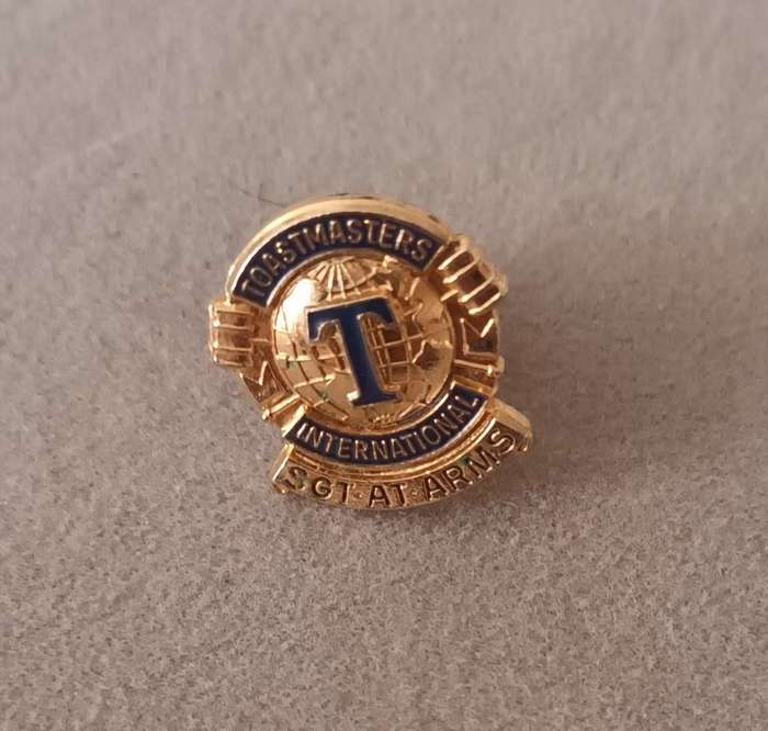 TOASTMASTERS INTERNATIONAL SERGEANT AT ARMS BADGE