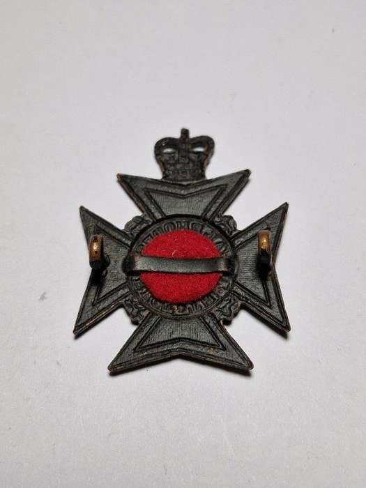 Royal Rhodesia Regiment cap badge. Queen's crown