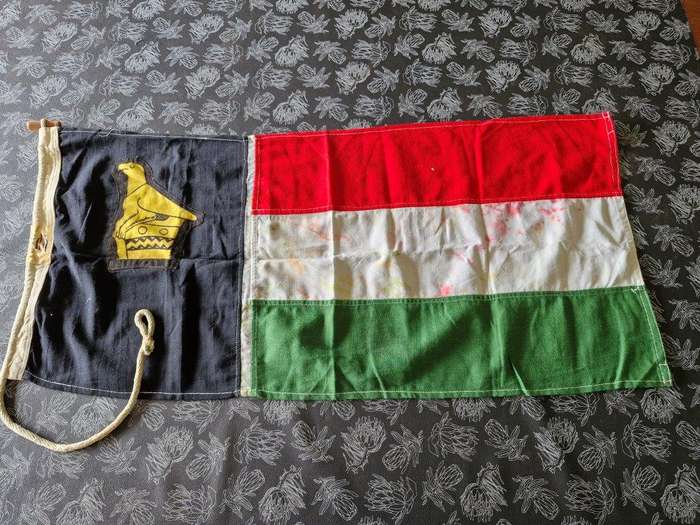 Zimbabwe Rhodesian flag. Rope and toggle intact. Maker William Smith and Gourock. 45 Cm x 100 Cm