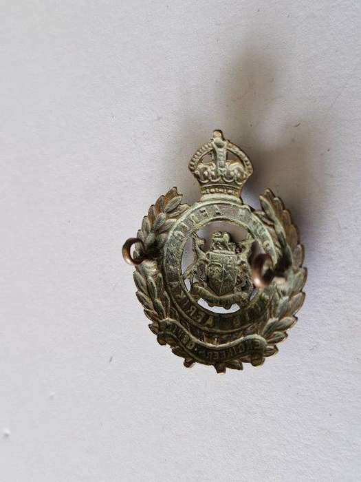 WWII South African Engineers cap badge domed type.